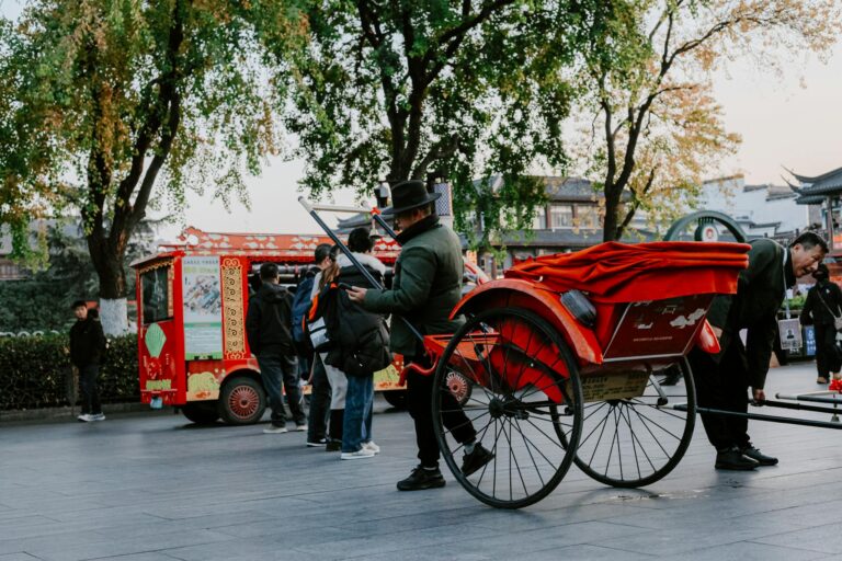 A vibrant scene of a traditional rickshaw and street vendor in Nanjing, China, during fall.